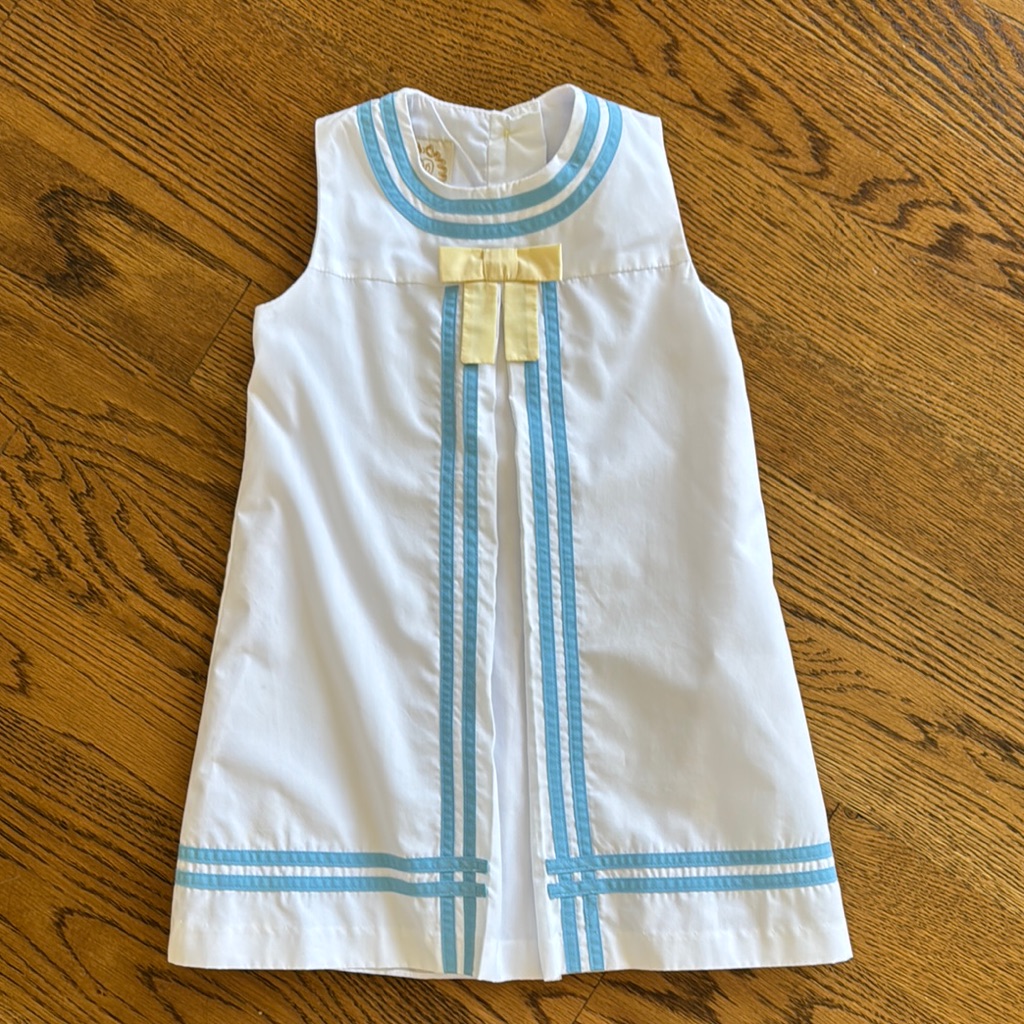 Girls White Dress With Light Blue Trim And Yellow Bow